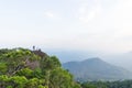 Group of the advernturer trekked on top of mountain with landscape background