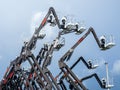 Group of aerial work platforms for construction and material handling. Close-up on the metal lift