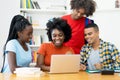 Group of african american and latin students working and learning at computer Royalty Free Stock Photo