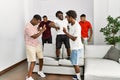 Group of african american people having party dancing at home Royalty Free Stock Photo