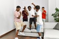 Group of african american people having party dancing at home Royalty Free Stock Photo