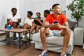 Group of african american people sitting on the sofa at home Royalty Free Stock Photo