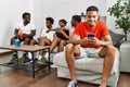 Group of african american people sitting on the sofa at home Royalty Free Stock Photo