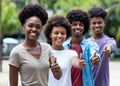 Group of african american young adults showing thumb up Royalty Free Stock Photo