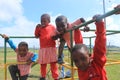 Group of African children playing outside in a playground, Swaziland, southern Africa Royalty Free Stock Photo