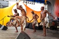 A group of  African dancers in traditional garb at the outdoor cultural event Royalty Free Stock Photo