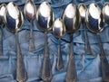 Group of aged dirty spoons