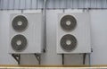 Group of air conditioner units on wall outside building