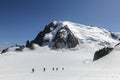 Group of alpinists climb Mont-blanc du Tacul, view from Aiguille du Midi in the French Alps, Chamonix-Mont-Blanc, France