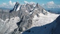 Alpinists Climbing The Montblanc Snowy Mountain