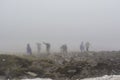 Group of alpinists climbing up on the top of the mountain