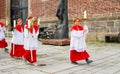 A group of Altar boys proceeds to church