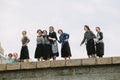 Group of Amish Young Women visiting the Statue of Liberty