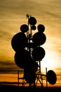 Group of antennas for digital transmissions at sunset Royalty Free Stock Photo