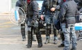 Group of anti-riot police officers with bullets and protective s Royalty Free Stock Photo