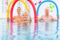 Group in aquarobic fitness swimming pool