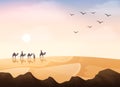 Group of Arab people riding with camels caravan in the desert Royalty Free Stock Photo