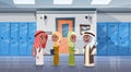 Group Of Arab Pupils Walking In School Corridor To Class Room, Muslim Schoolchildren Royalty Free Stock Photo