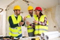 Group of architects consult about the project on construction si Royalty Free Stock Photo
