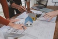 Group architects and engineers build houses and conference buildings together to design and build structures, sketch house plans