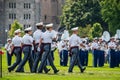 A Group of Army cadets marching with swords in formation on the parade field at West Point Military Academy Royalty Free Stock Photo