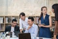 Group of Asian business people team meeting in modern office working design planning and ideas concept. Royalty Free Stock Photo