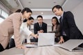 Asian Business Team Having a Brainstorm in a Meeting Royalty Free Stock Photo