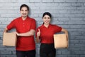 Group of asian courier team carry the parcel