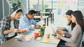 Group of asian creative people working at office, Business team meeting to plan the project, creative office lifestyle Royalty Free Stock Photo