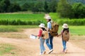 Group asian family children walking in the jungle adventure camping. Student tourism traveling destination leisure trips for educa Royalty Free Stock Photo