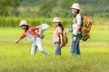 Group asian family children walking in the jungle adventure and tourism for destination and leisure trips for education and relax