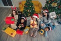 Group of asian friends happy together with christmas or new years celebration party with christmas or new years gifts sharing