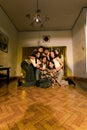 a group of Asian people hanging out with their friends in an old room while on vacation together Royalty Free Stock Photo