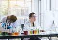 Group of asian scientist working and explaining research information together in the laboratary Royalty Free Stock Photo