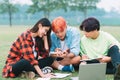 Group of asian students are studying in the park Royalty Free Stock Photo