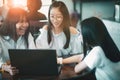 Group of asian teenager working on  laptop computer with happiness emotion Royalty Free Stock Photo