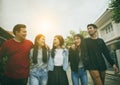 group of asian younger man and woman relaxing toothy smiling face with happiness emotion Royalty Free Stock Photo