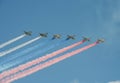 A group of assault plane Sukhoi Su-25 Grach NATO reporting name: `Frogfoot` in the sky smoke colors of Russian flag at the rehea