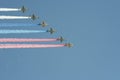 A group of assault plane Sukhoi Su-25 Grach NATO reporting name: `Frogfoot` in the sky smoke colors of Russian flag at the rehea