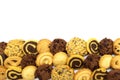 A group of assorted cookies. Chocolate chip, oatmeal, raisin, Danish cookies and biscuits in the shape of a spiral pattern isolate Royalty Free Stock Photo