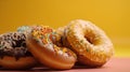 Group of assorted donuts. Chocolate, pink, yellow, green and red on colored background.