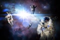 group of astronauts walking in space and completing space mission, elements of this image furnished by nasa b