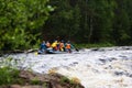 Group of athletes floats on an inflatable catamaran