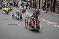 Group of athletes with their special bikes on a city track in a race