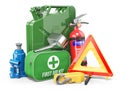 Group of automobile accessories. Jerrycan, funnel, fire extinguisher, first aid kit, tow rope, jack and emergency warning Royalty Free Stock Photo