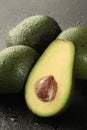 Group of avocado with half on black background Royalty Free Stock Photo