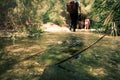 Group of backpackers fording cold river