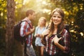 Group of backpacking hikers going for forest trekking Royalty Free Stock Photo