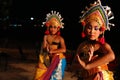 Group of Balinese dancers perform on beach