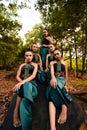 A Group of Balinese people wearing traditional green costume before the dance festival begin